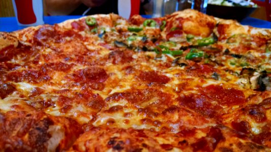 Brown And Red Pepperoni Pizza photo
