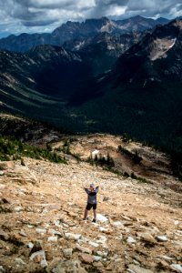 Hiker On Rocky Hillside