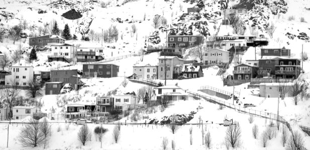 Village On Mountain Covered With Snows photo