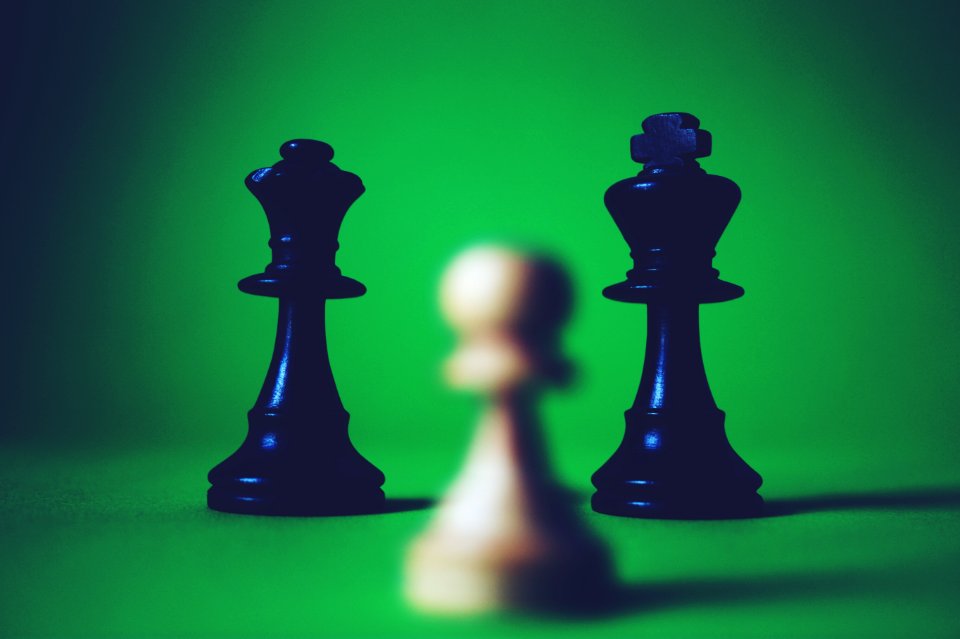 Chess Pieces On Green