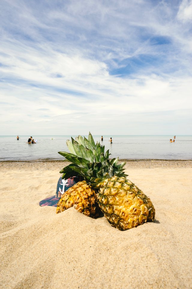 Pineapples On Sandy Beach