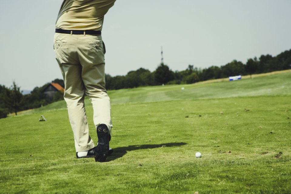 White Golf Ball On Field