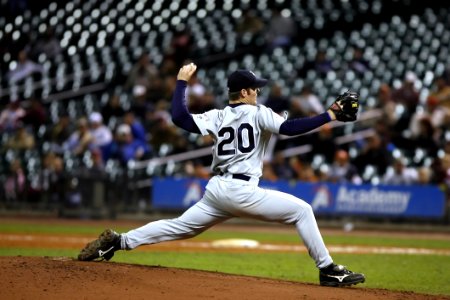 Selective Focus Of Baseball Pitcher In 20 Jersey About To Throw Ball