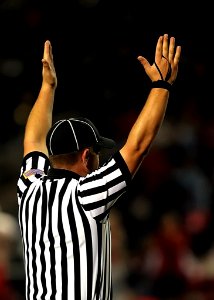 Referee Raising Both Hands