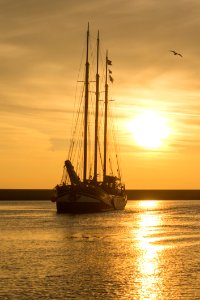Sailboat At Sunset photo