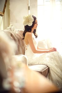 Woman In White Floral Wedding Dress photo