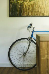Bicycle Resting Against An Indoor Wall photo