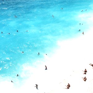 People Swimming In The Sea