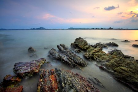 Rocky Ocean Shoreline At Sunrise