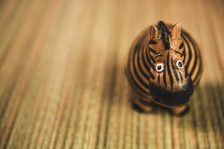 Close Photography Of Beige And Black Zebra Toy photo