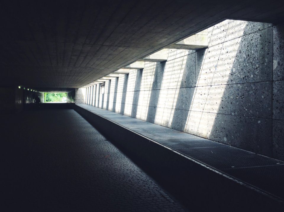 Sunlight Streaming Through Concrete Opening Of Underground Passageway