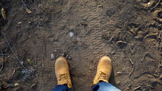 Feet On Dirt Ground