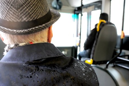 Man Wearing Black Coat While Wet photo