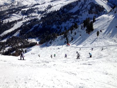 Person Riding On Snowboard On The Snow During Daytime photo