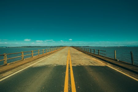 Grey Concrete Road In The Middle Of The Sea photo