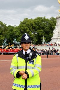 Man In Officers Uniform Black Standing During Parade