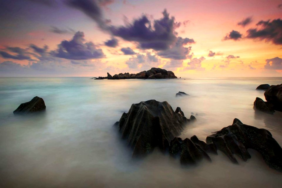 Time Lapse Photography Of High Rise Mountain Covered With Clouds