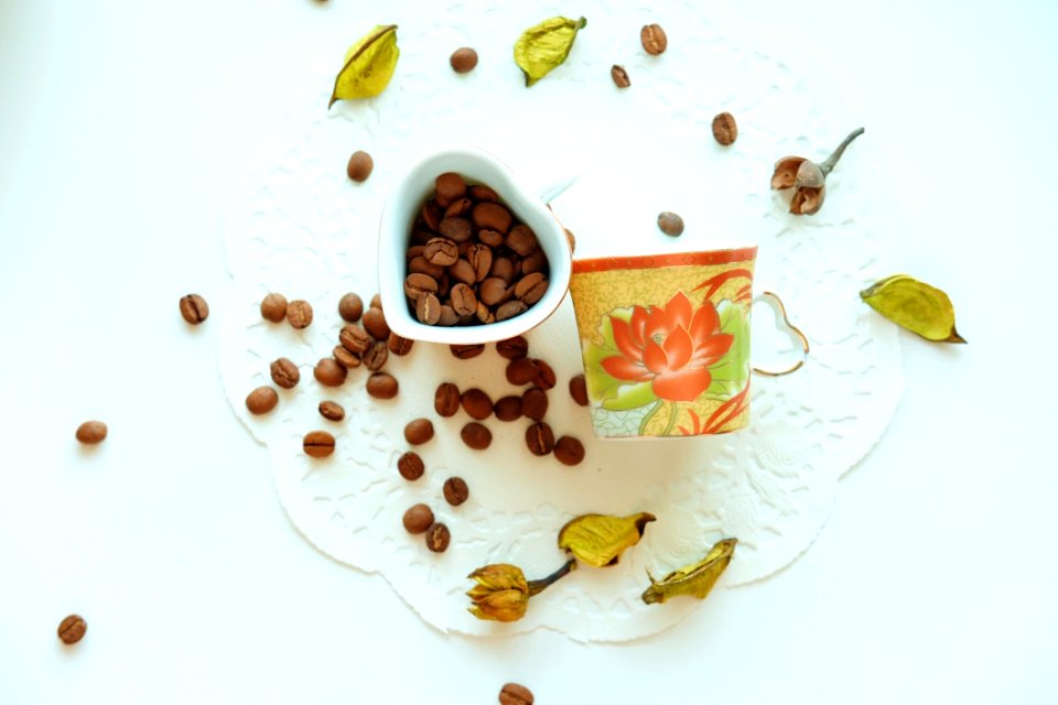Brown Coffee Beans On White Ceramic Container