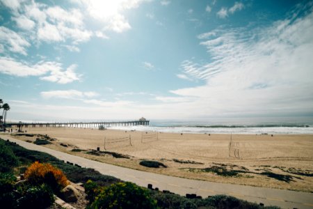 Sandy Beach And Wooden Pontoon