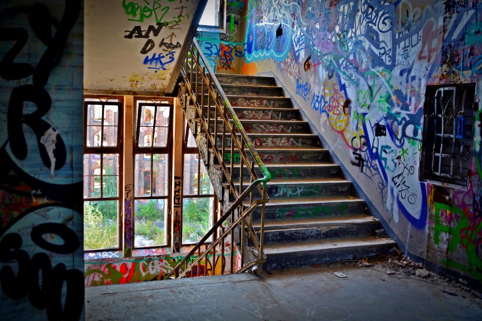 Graffiti Wall With Wrought Iron Donwstairs