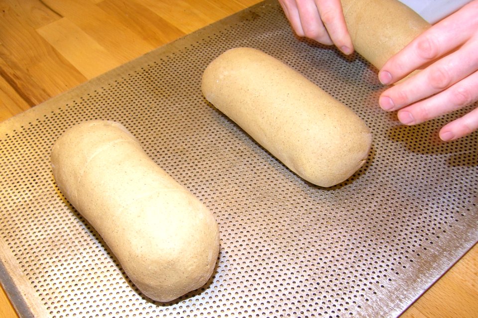 Person Making Brown Bread