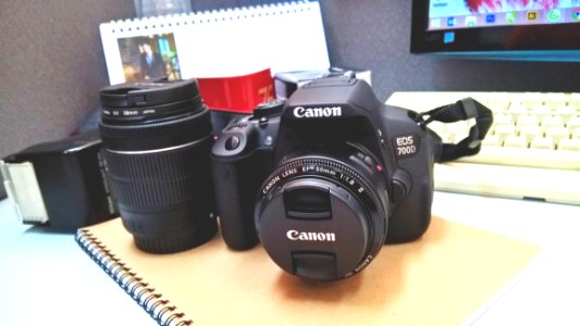 Canon Eos 7000 Dslr Camera photo