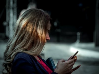 Woman Using Her Smartphone photo