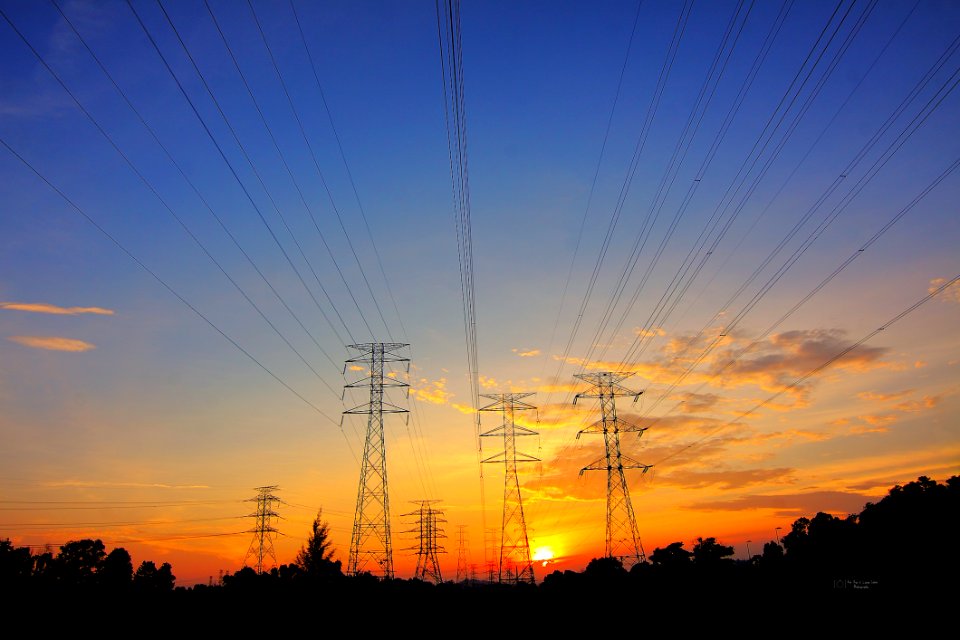 Power Transformers At Sunset