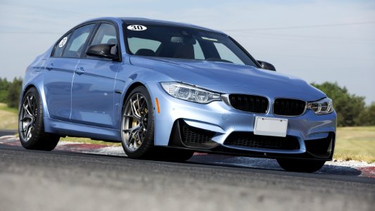 Blue Sedan During Daytime