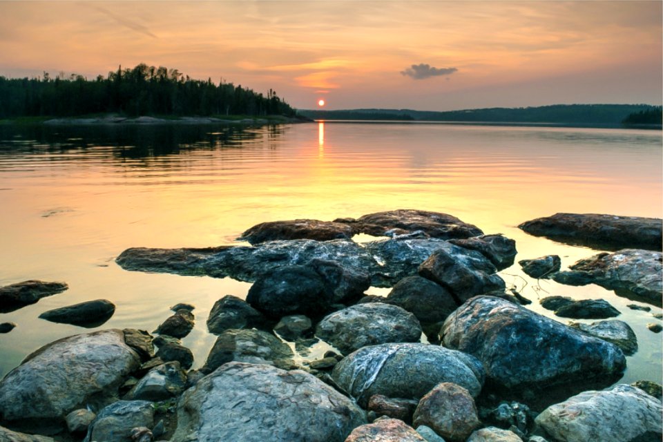 Rocky Lake Shore During Sunset