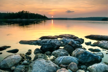 Rocky Lake Shore During Sunset