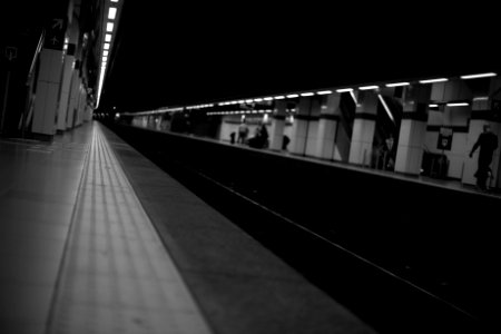 People Walking On Train Station Greyscale Photography photo