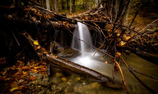 Time Lapse Photography Of Falls Surrounded By Trees photo