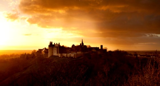 Castle On Top Of Hill At Sunset photo