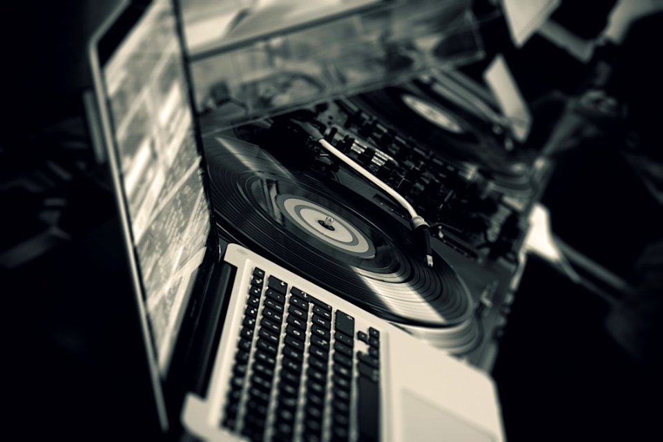 Black Turntable Beside White Laptop Computer