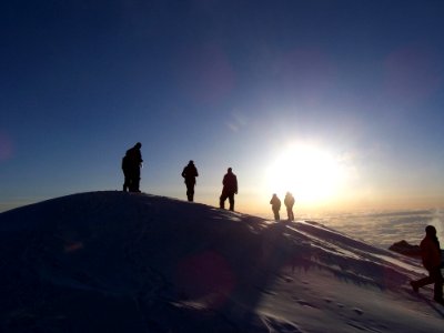 People Hiking On Mountain During Daytime