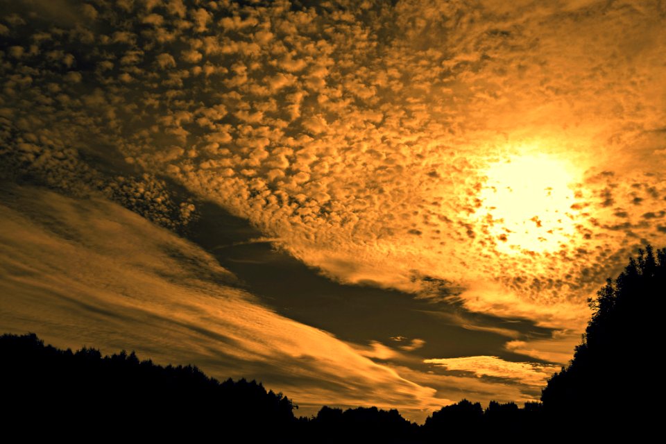 Partly Clouded Sky At Sunset