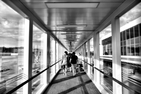 Person Carrying Bag Walking On Path Way photo