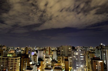 Aerial View Of City With High Rise Building At Night Time photo