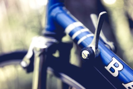 Blue Bicycle In Close Up Photography photo