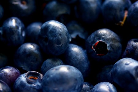 Close Up Photography Of Grey Round Fruits photo
