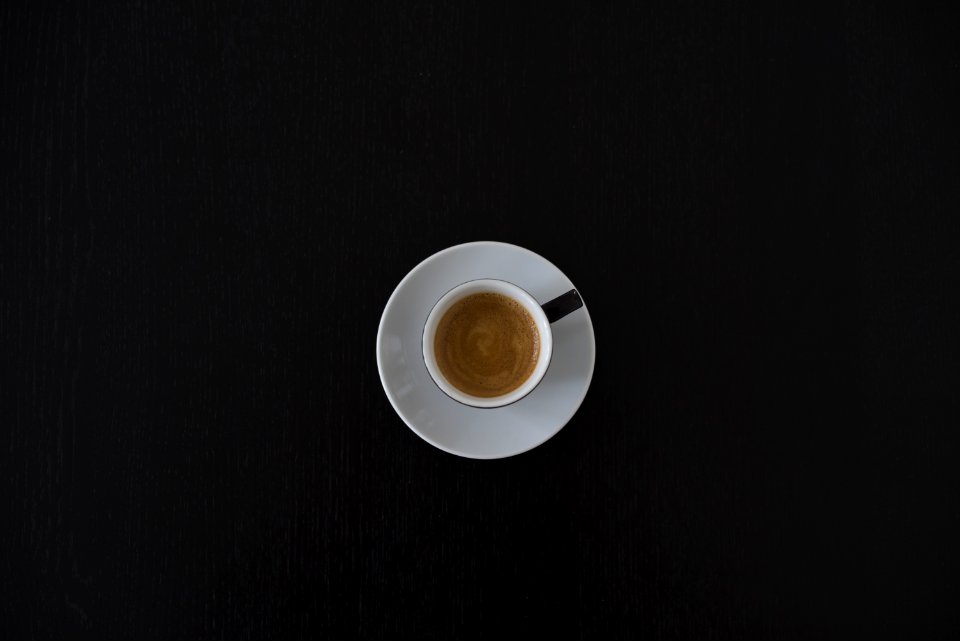 White Ceramic Coffee Cup On White Saucer photo