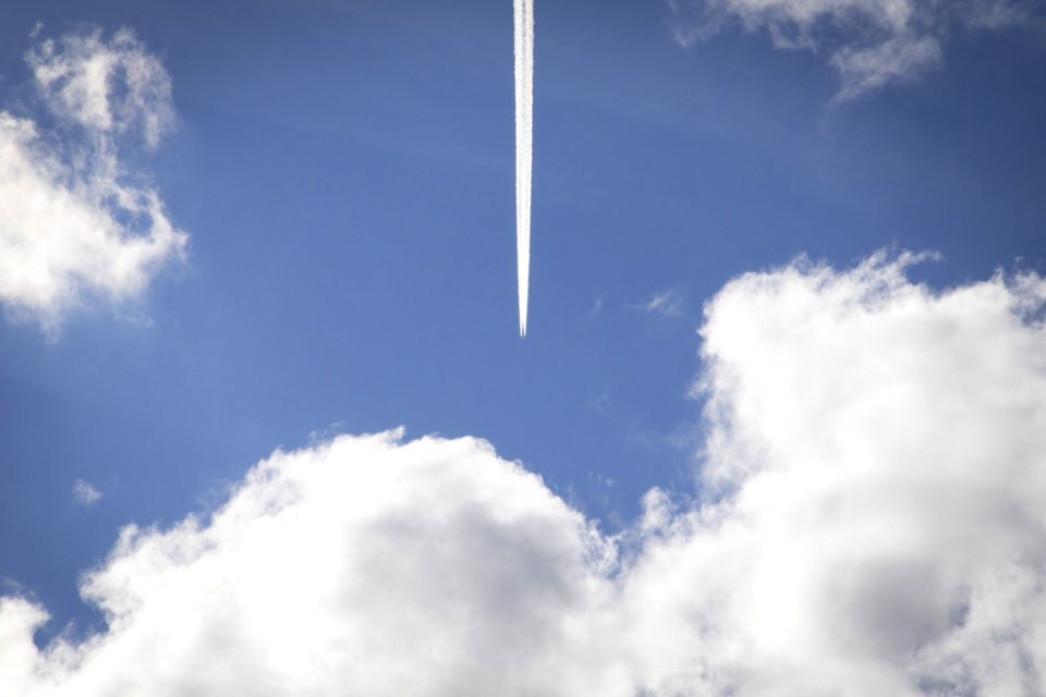 Airplane Streak In Sky