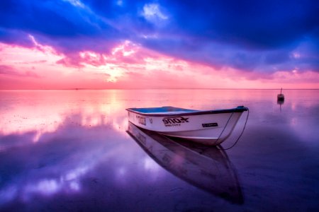 Wooden Boat At Sunset photo