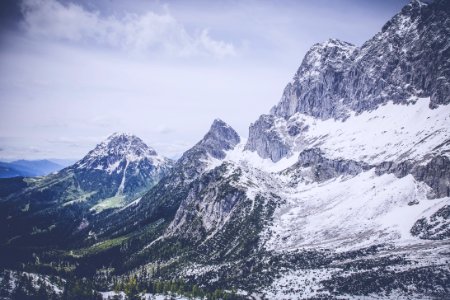 Snow On Gray Black Mountain Range photo