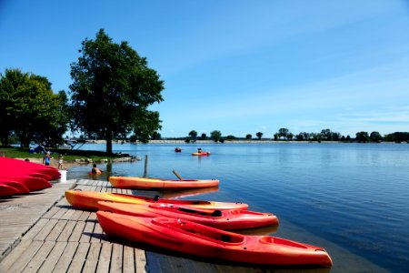Bright-red canoes at Brittingham Park's beach on Lake Monona in Madison, Wisconsin's capital city. Original image from Carol M. Highsmith’s America, Library of Congress collection.