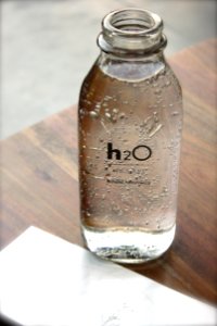 Clear Glass H2o Bottle photo