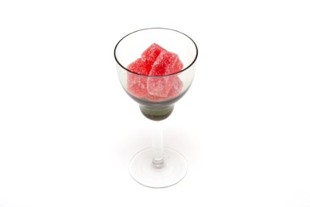 Red Gummies In Clear Wine Glass photo