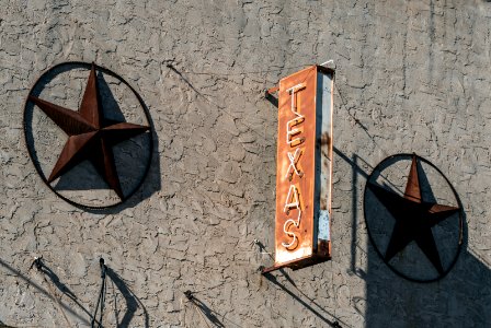 "Texas" sign on an old building in Stanton, Texas. Original image from Carol M. Highsmith’s America, Library of Congress collection. photo