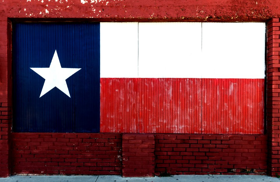 Texas flag, painted on boarded-up window in Brownwood, the seat of Brown County in Central Texas. Original image from Carol M. Highsmith’s America, Library of Congress collection.